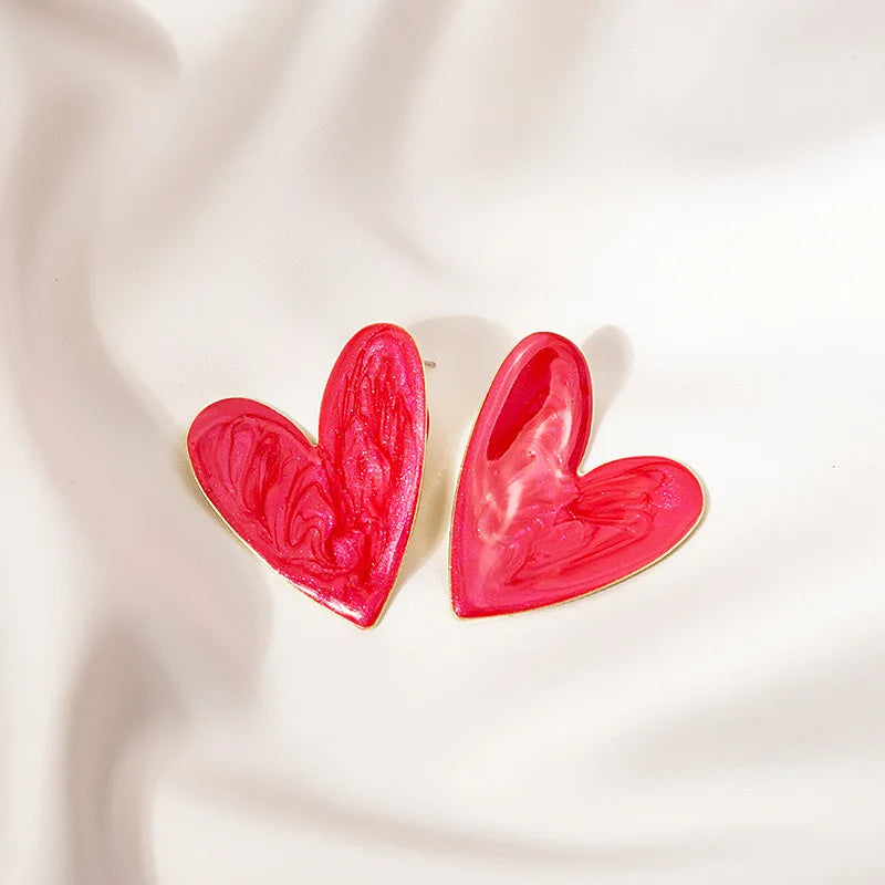 Herzförmige Ohrstecker - sunny.side-Productions