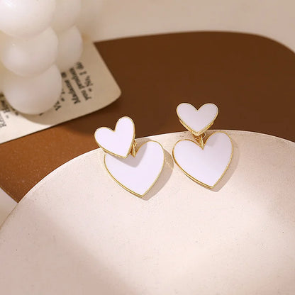 Herzförmige Ohrstecker - sunny.side-Productions