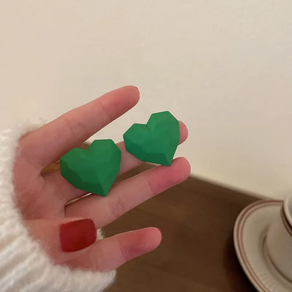 Herzförmige Ohrstecker - sunny.side-Productions