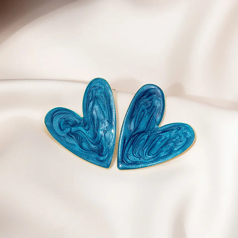 Herzförmige Ohrstecker - sunny.side-Productions